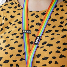 Load image into Gallery viewer, rainbow lanyard with black enamel pronoun pin